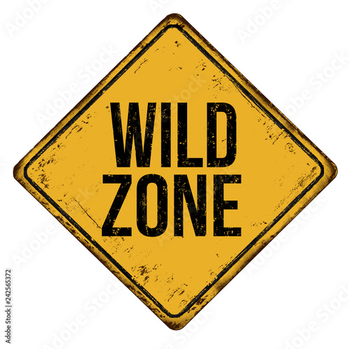 Wild zone vintage rusty metal sign