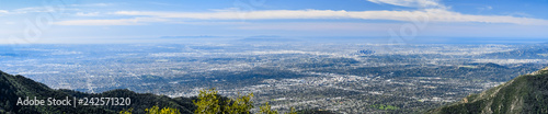 Panoramic aerial view of Los Angeles and the metropolitan area surrounding it; Pacific Ocean coastline in the background, south California photo