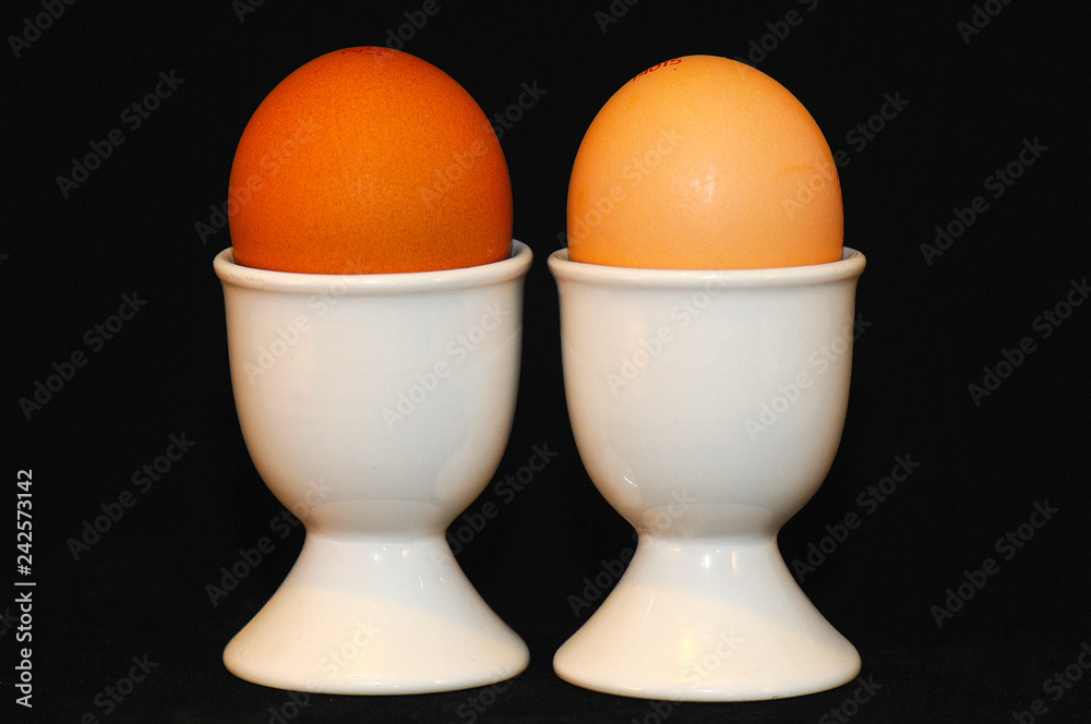 Two eggs in an egg cup Two eggs in an egg cup