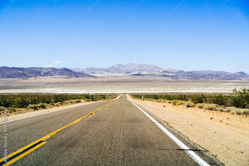 Highway through the Mojave Desert, California Highway through the Mojave Desert, California
