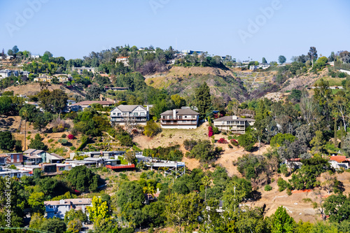 Scattered houses on one of the hills of Bel Air neighborhood, Los Angeles, California photo