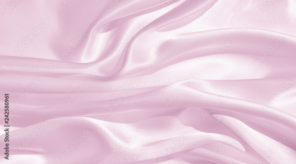 Fototapeta premium The texture of the satin fabric of lilac color for the background