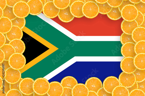 South Africa flag  in fresh citrus fruit slices frame photo