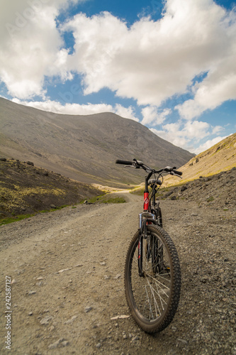 Red bike on the mountain road