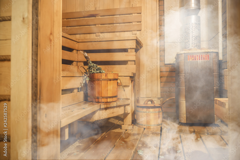 Interior of Finnish sauna, classic wooden sauna, Relax in hot sauna Interior of Finnish sauna, classic wooden sauna, Relax in hot sauna