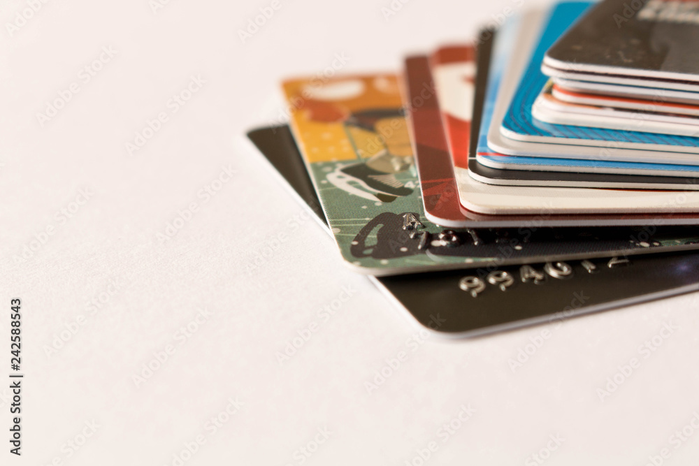 Stack of credit cards . Isolated on white background. Empty text space. Stack of credit cards . Isolated on white background. Empty text space.