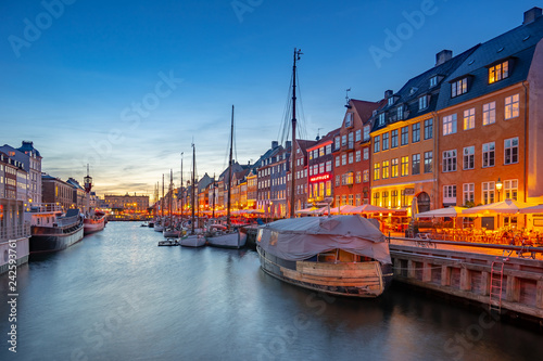 Copenhagen city at night with view of Nyhavn in Denmark