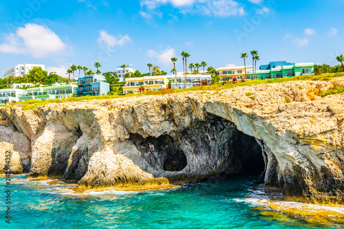 Sea caves at cap greco in the south-eastern cyprus photo