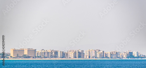 Seaside of Varosia with spectacular ruins of hotels, Famagusta, Cyprus photo