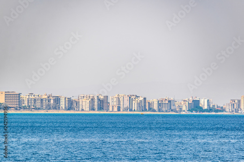 Seaside of Varosia with spectacular ruins of hotels, Famagusta, Cyprus photo