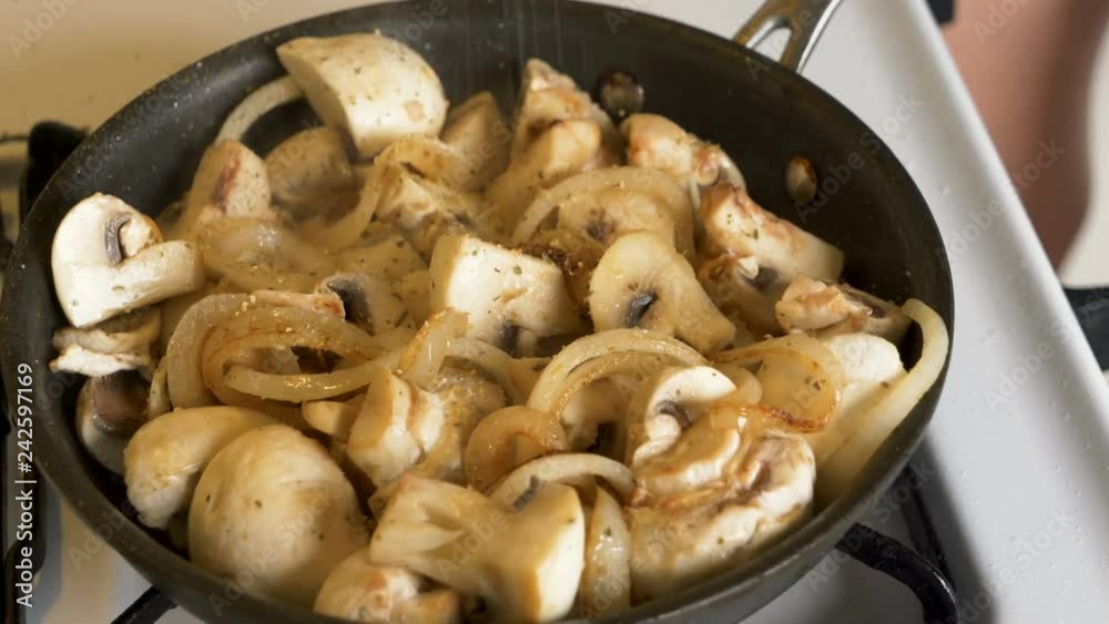 champignon mushroom roasting on pan with onion
champignon mushroom roasting on pan with onion