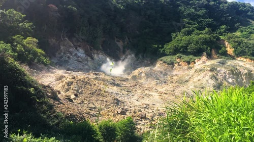 Smoking volcano hole in Soufriere volcano drive-in volcano, Saint lucia photo