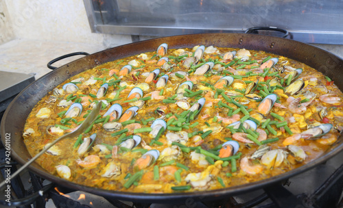 Spanish paella served in all inclusive resort photo