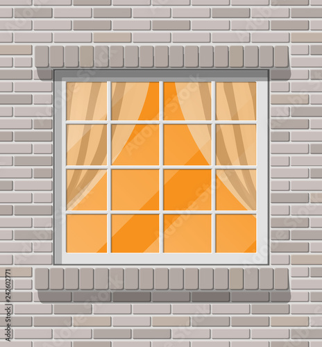 Building facade. Classic window in brick wall.