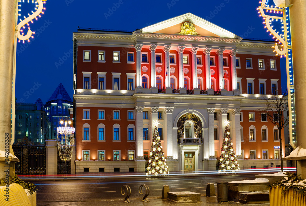 Moscow, Russia, New Year at the city hall. The city hall is designed in red and white. The Central part of the building is allocated 8-column portico with pediment. 