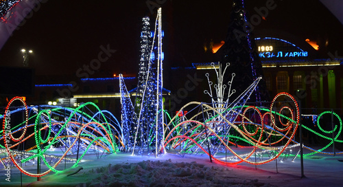 New Year tree and decorations on the railway square © ola_pisarenko
