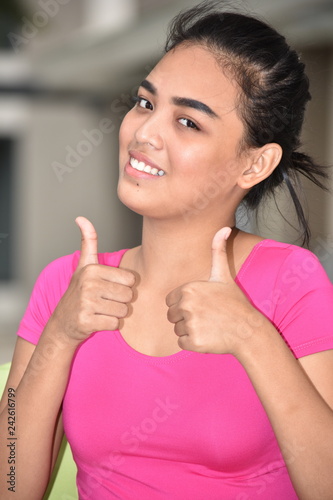 Teenage Female With Thumbs Up
