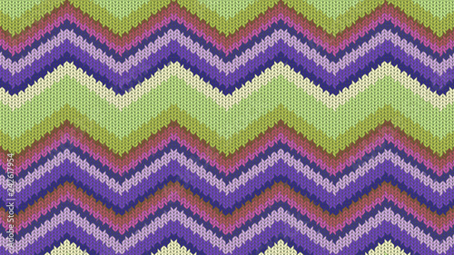 Background with a knitted texture  imitation of wool. Multicolored diverse lines.