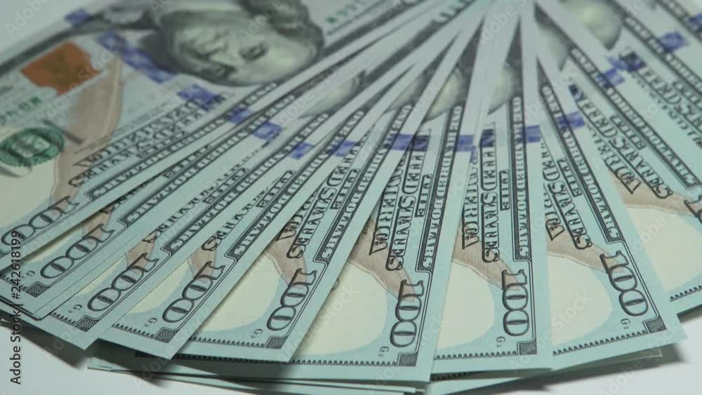 US dollar in the hands on a white background US dollar in the hands on a white background