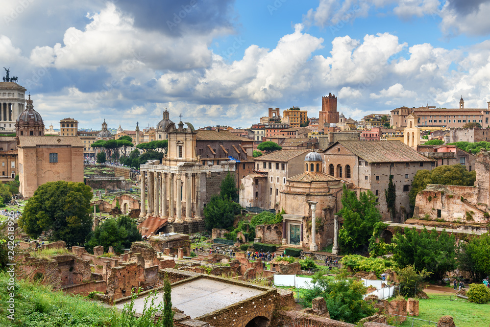 Ruins of Roman Forum. Temple of Antoninus and Faustina, Basilica of Santi Cosma e Damiano and others. Rome. Italy