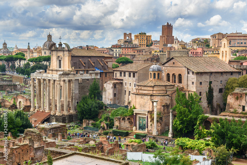 Ruins of Roman Forum. Temple of Antoninus and Faustina, Basilica of Santi Cosma e Damiano and others. Rome. Italy