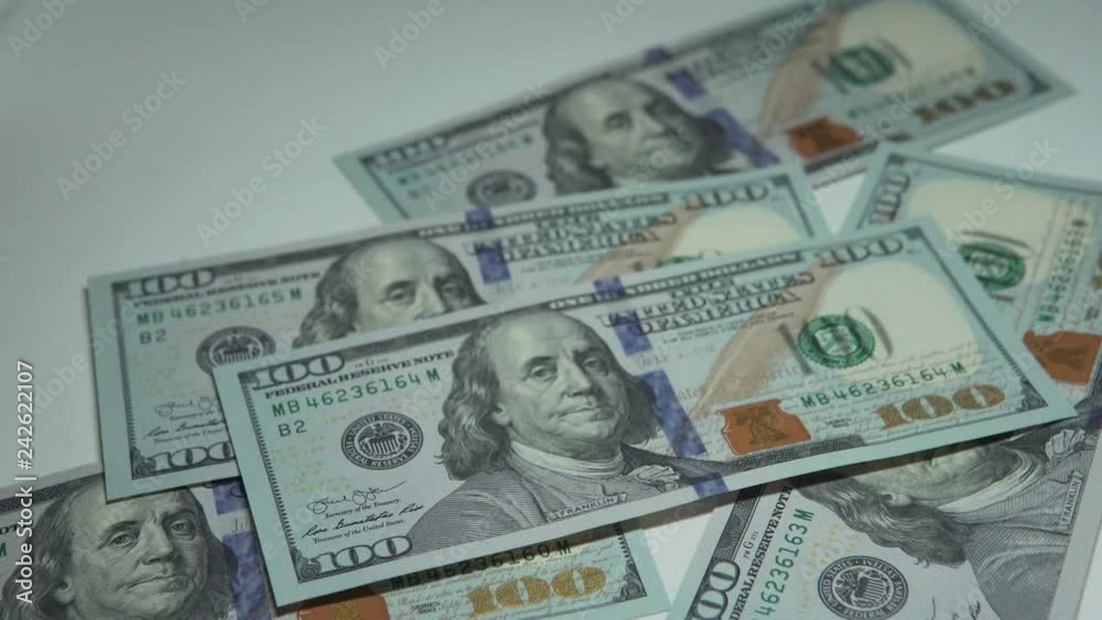 US dollar in the hands on a white background US dollar in the hands on a white background