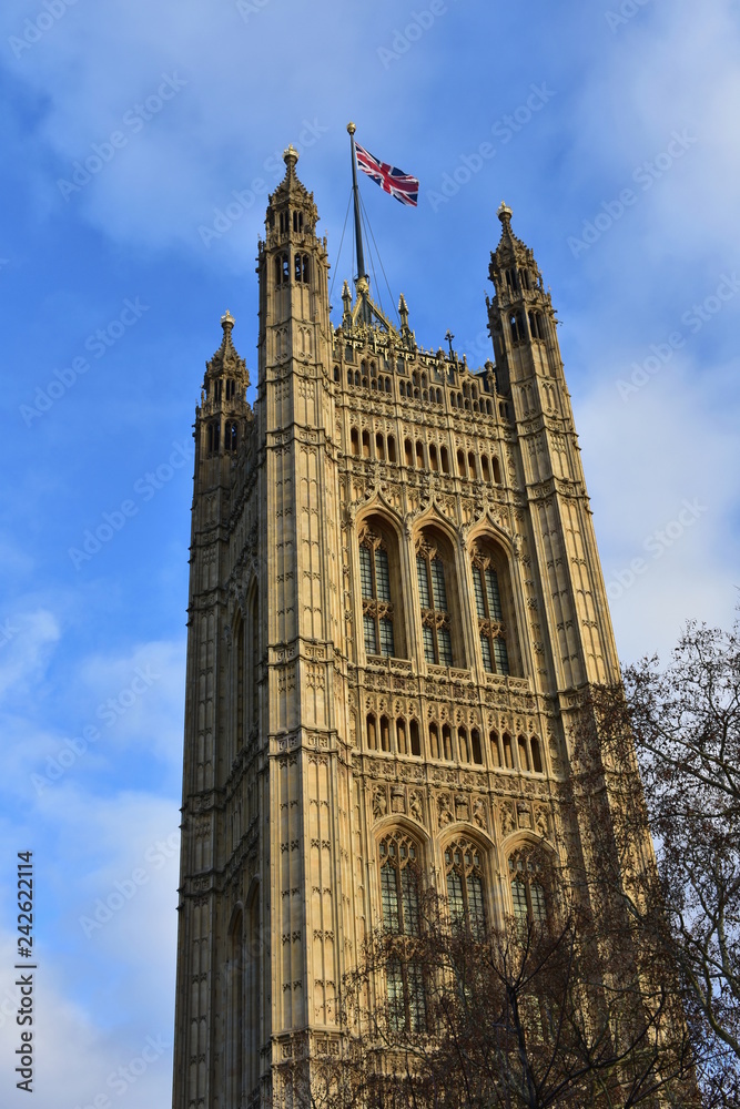 Victoria Tower with the flag of Great Britain. City of Westminster, Houses of Parliament. London, United Kingdom. Victoria Tower with the flag of Great Britain. City of Westminster, Houses of Parliament. London, United Kingdom.