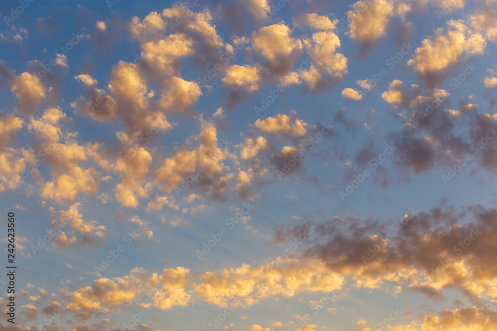 Clouds in the sky at sunset as a background Clouds in the sky at sunset as a background