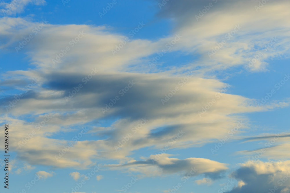 Obraz premium Clouds after rain before sunset as a background