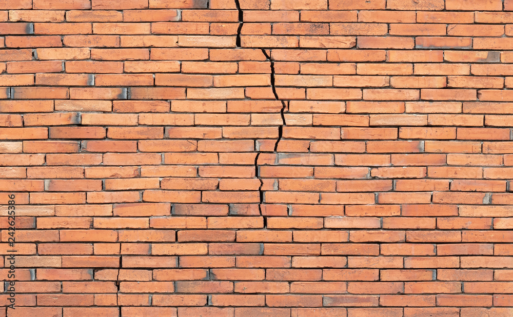 Fototapeta premium Old red brick wall cracked