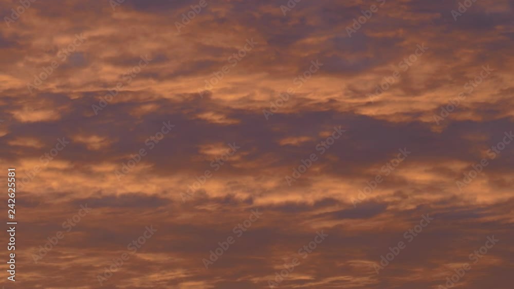 Orange light cloudy sky, evening glow, background Orange light cloudy sky, evening glow, background