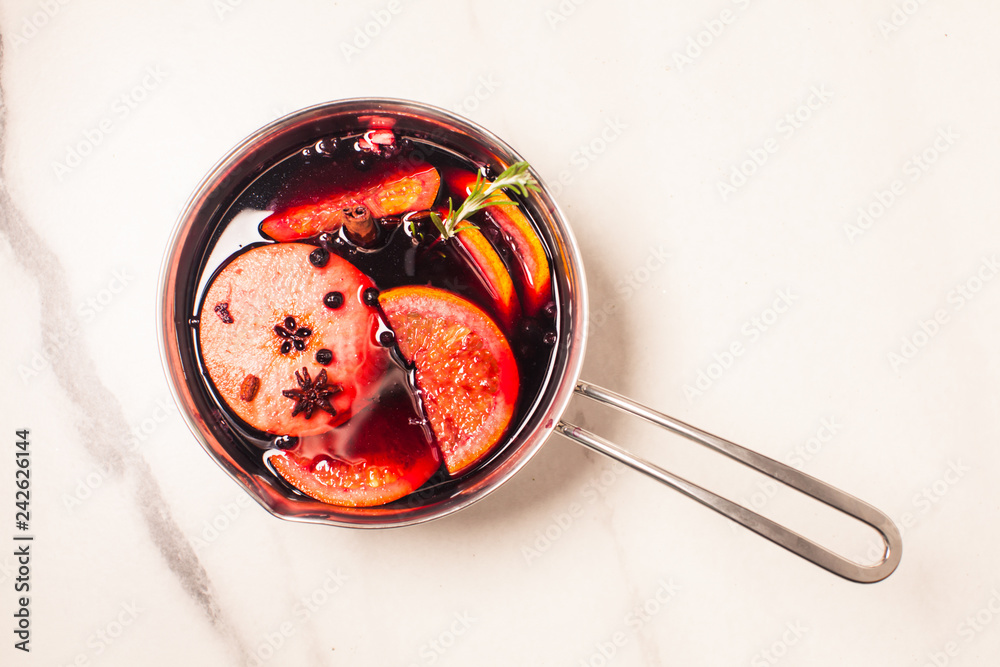Mulled wine - hot drink with citrus and spices