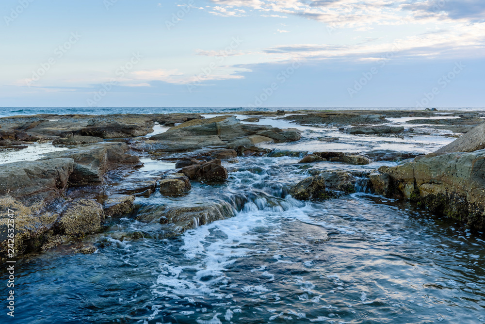 landscape with sea, rocks and blue sky with clouds in Australia landscape with sea, rocks and blue sky with clouds in Australia