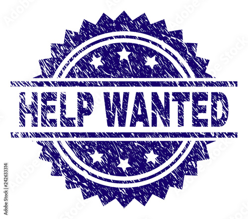 HELP WANTED stamp seal watermark with distress style. Blue vector rubber print of HELP WANTED label with unclean texture.