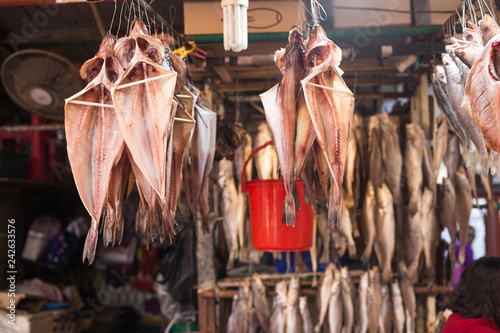 Dried fish hanging on a rope © bong