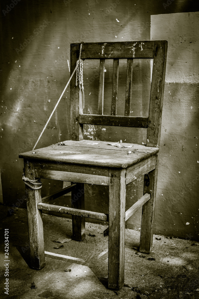 single wooden chair with horror, old single wooden broken chair Stock Photo  | Adobe Stock