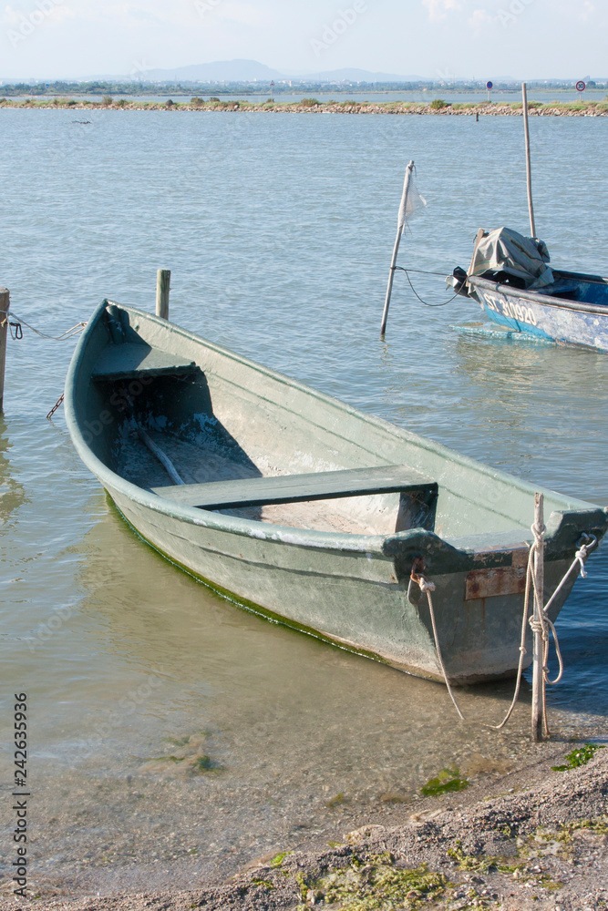 Maguelone France 12-17-2018. Old fish boats moored on a pond at Maguelone France Maguelone France 12-17-2018. Old fish boats moored on a pond at Maguelone France