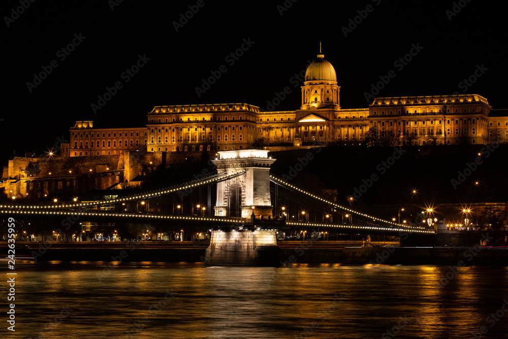 Budapest, Hungary - December 08, 2018:  Hungarian landmarks, Chain Bridge, Royal Palace and Danube river in Budapest at night. Photo Image