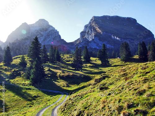 View at the Alpine peaks Zuestoll and Brisi in the Churfirsten mountain chain - Cantons of St. Gallen, Switzerland photo