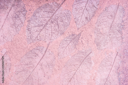 Blurred for Background.Pink cement floor with pattern surface made of leaves.