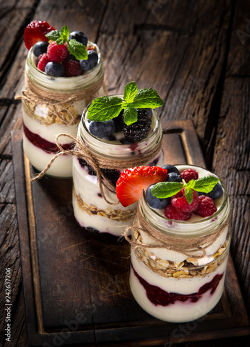 Tasty yoghurts with muesli,...
