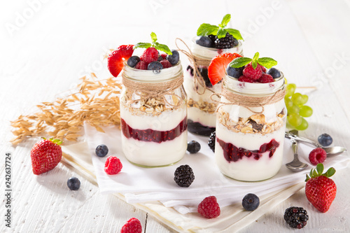 Tasty yoghurts with muesli,...