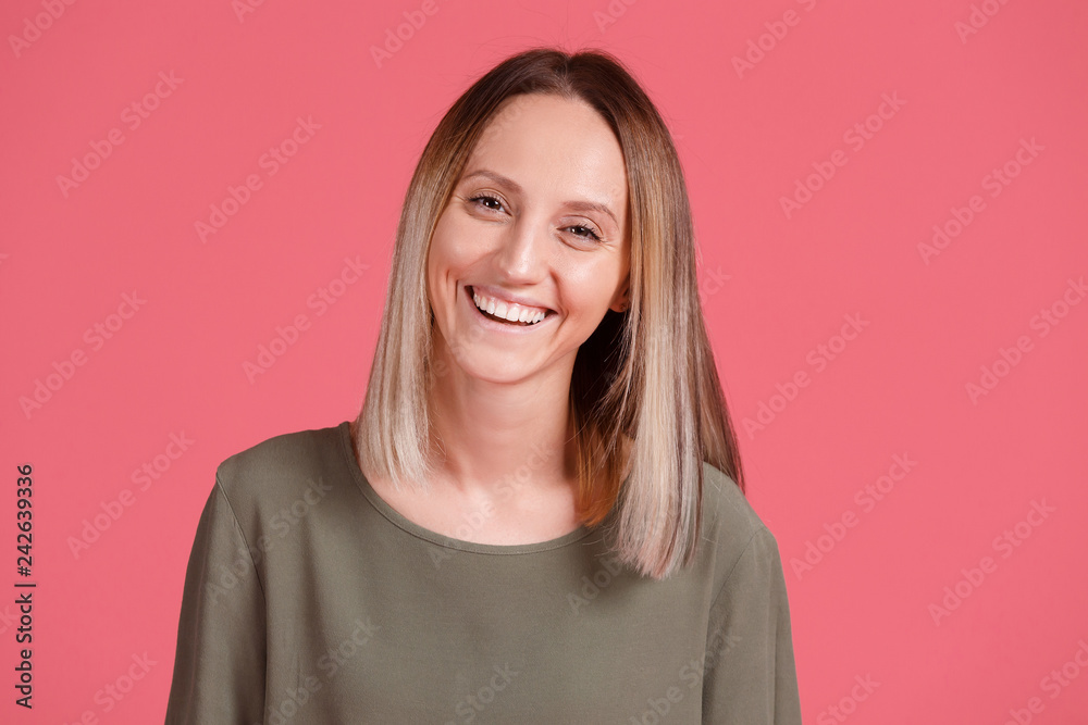 Portrait of young excited smiling woman in green T-shirt. Funny happy girl with ombre on pink background looking at camera. People expression, portrait happy girl Portrait of young excited smiling woman in green T-shirt. Funny happy girl with ombre on pink background looking at camera. People expression, portrait happy girl