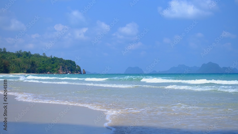 A beautiful sea beach with water waves and a horizontal line,blue sky in bright day