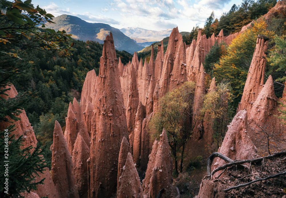 Earth pyramids with stones on top in Renon Ritten region, South Tyrol, Italy.