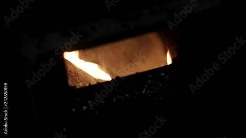 coal burns in the boiler furnace photo