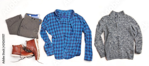 Fotografía Brown trousers blue checkered flannel shirt gray wool sweater, brown leather sho