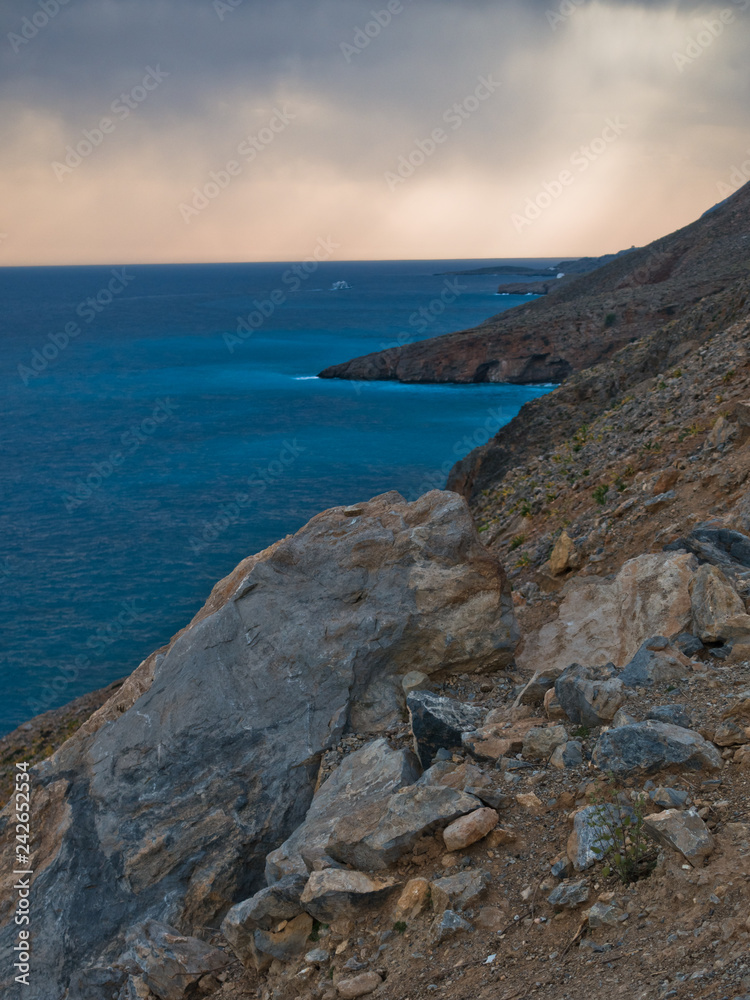 Rocky coast arond village of Chora Sfakion, south-west coast of Crete island, Greece