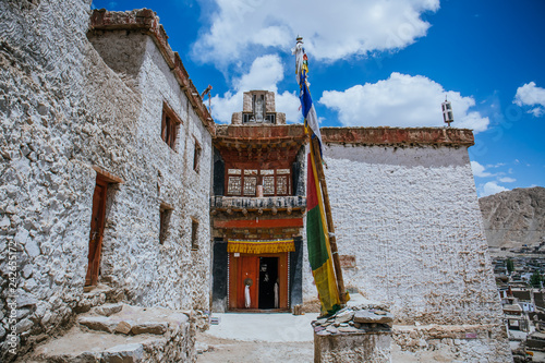 Leh palace monastery door entrance with Buddhist designs and decoration, Ladakh, India photo