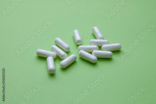 pills on green background